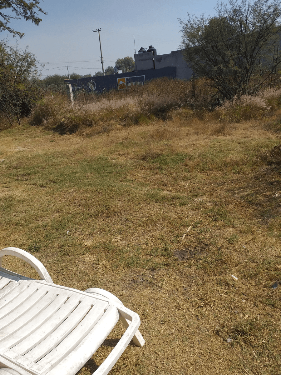 TERRENO CON CONTRUCCIÓN